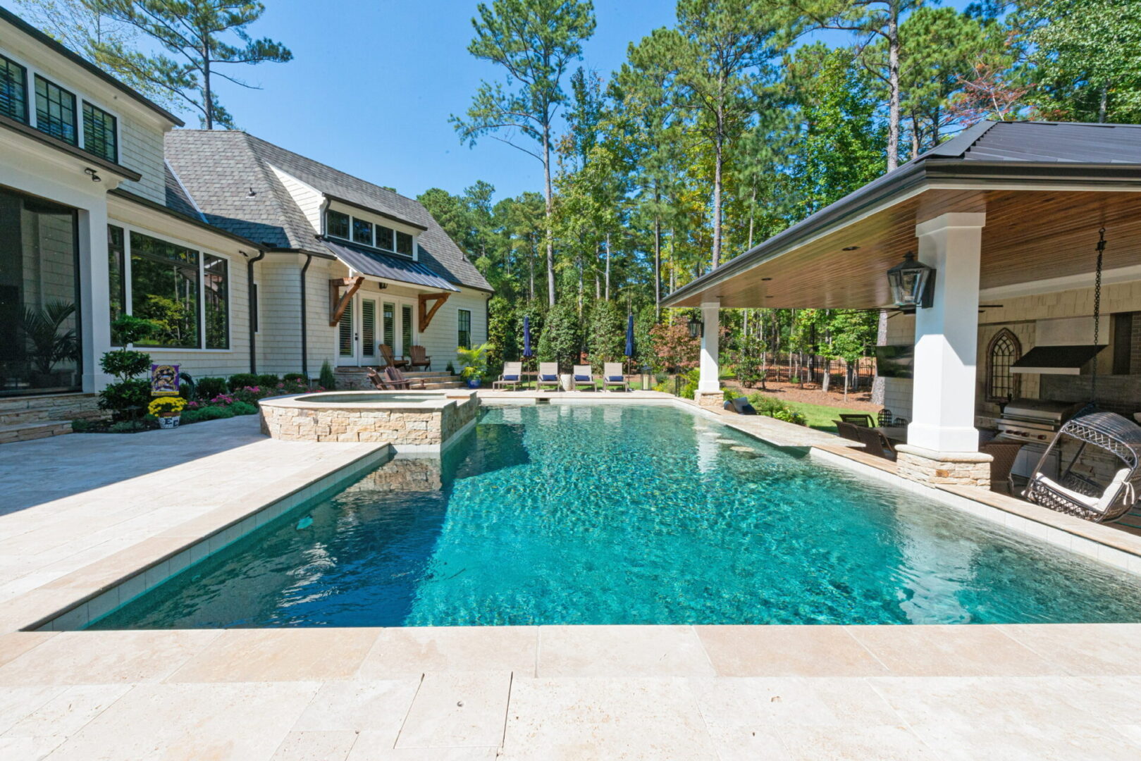 A luxury house with swimming pool and sitting area